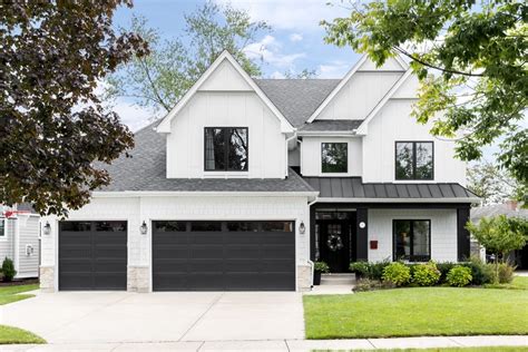 white house with dark metal windows|black trimmed windows exterior.